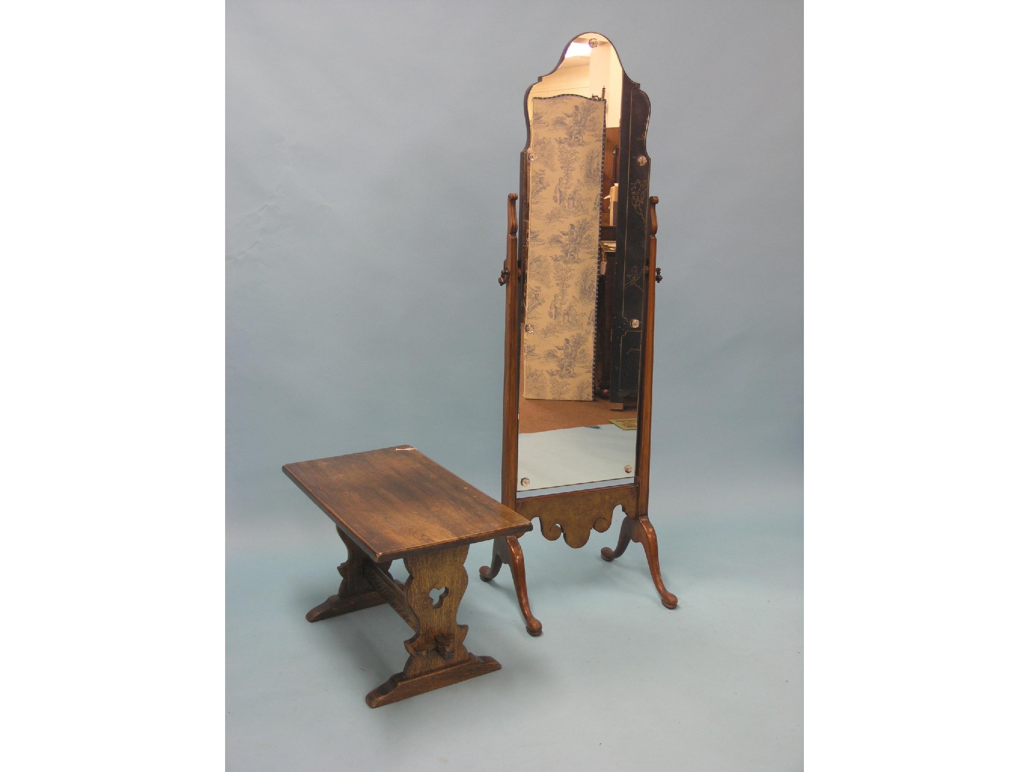 Appraisal: A walnut and burr walnut cheval mirror adjustable frameless mirror