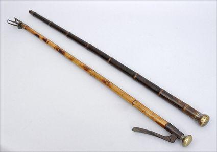 Appraisal: IRON-HANDLED BAMBOO FRUIT PICKER AND A BRASS-HANDLED WALKING STICK The