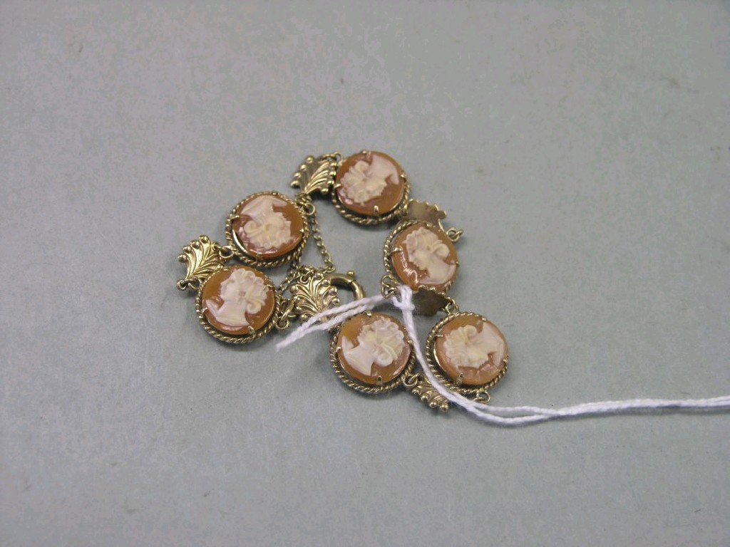 Appraisal: A ct gold bracelet six small cameo reliefs each separated