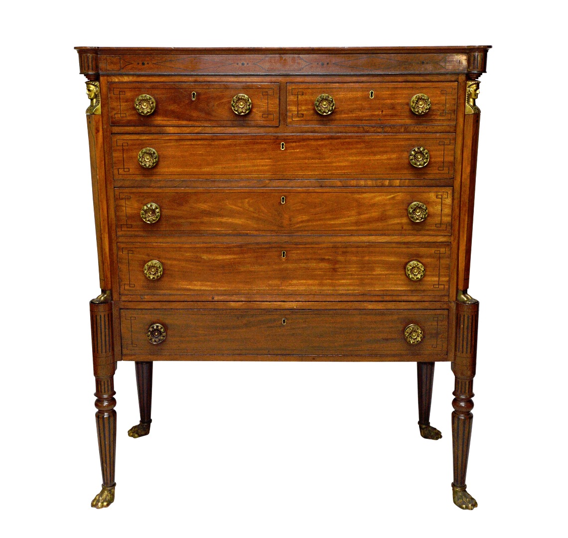 Appraisal: A Regency gilt metal mounted inlaid mahogany chest on stand