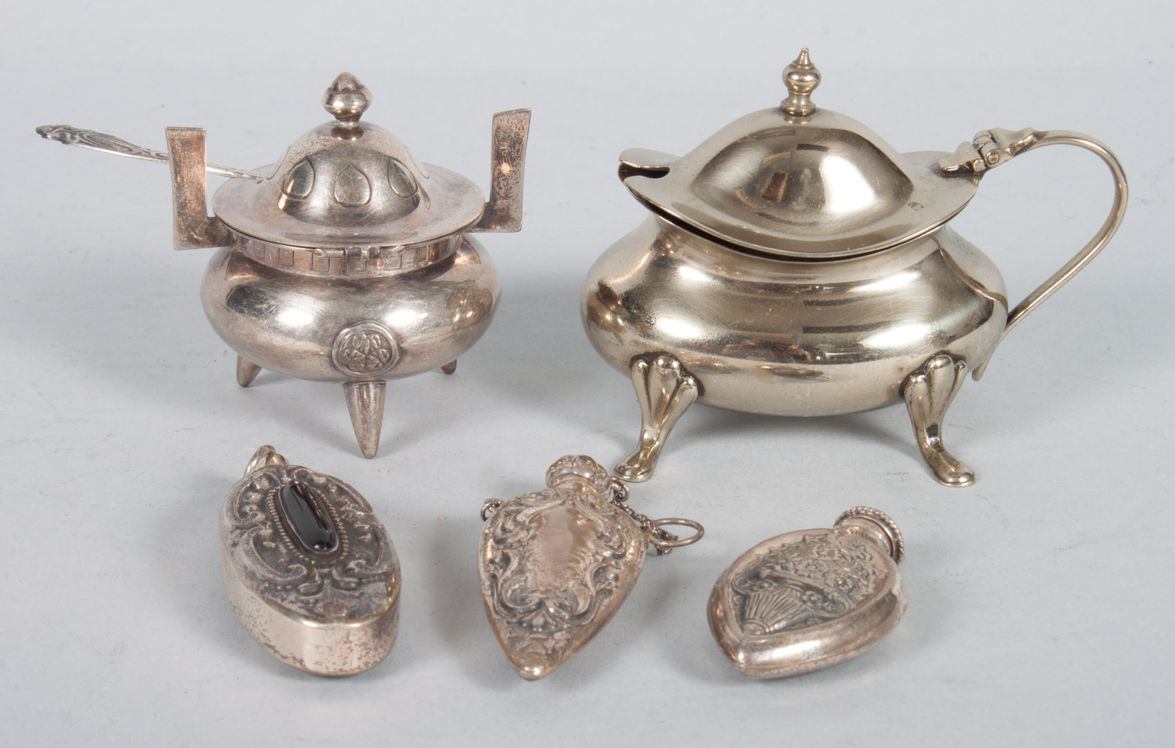 Appraisal: Three miniature sterling scent bottles together with a sterling salt