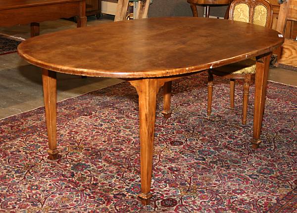 Appraisal: A Neoclassical provincial style walnut dining table height in width