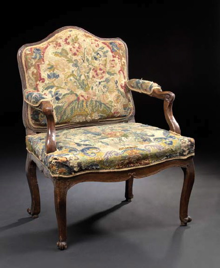 Appraisal: Provincial Louis XV Walnut Fauteuil mid- th century the domed