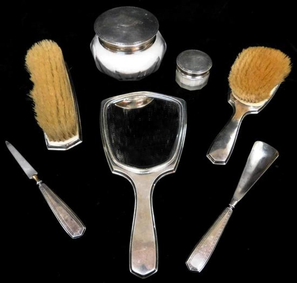 Appraisal: SILVER Deco style vanity set with Greek key design seven