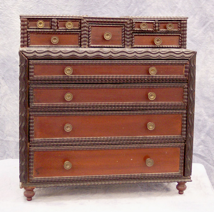 Appraisal: Ripple front pine folk art miniature chest top with an