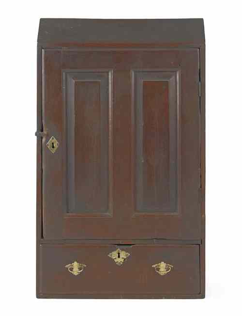 Appraisal: Pennsylvania Queen Anne walnut hanging cupboard ca with a slanted