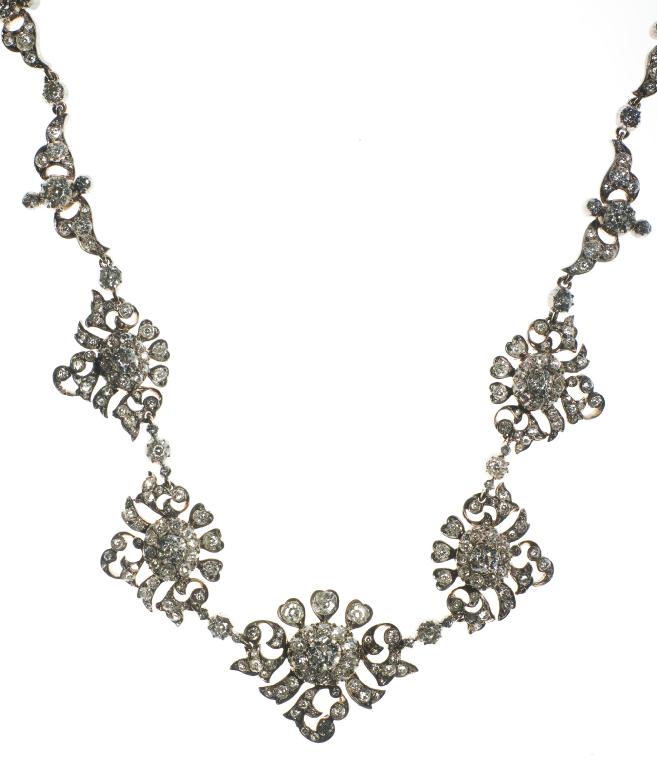 Appraisal: DIAMOND NECKLACE c the front composed of five graduating scroll