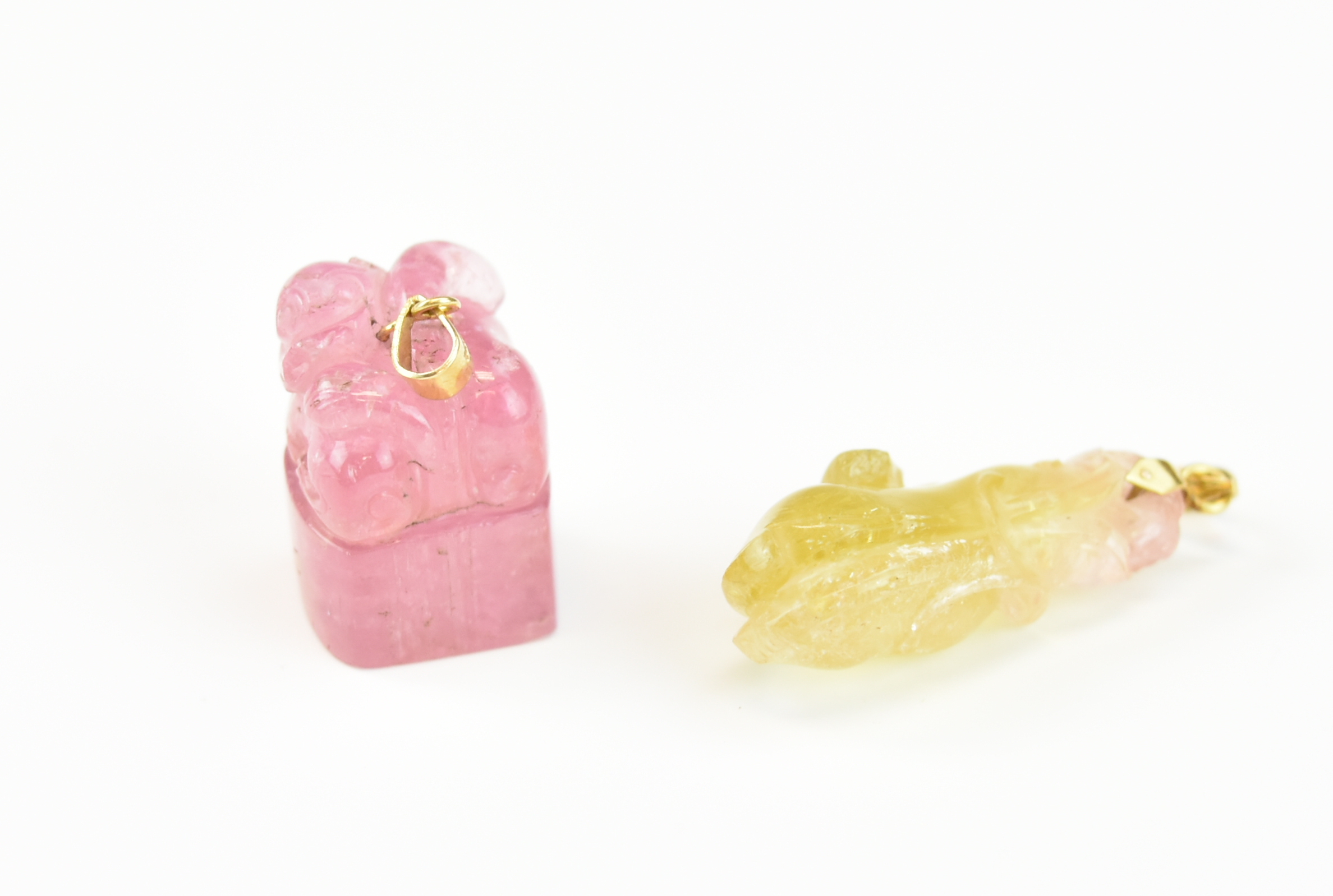 Appraisal: TWO CHINESE PINK YELLOW TOURMALINE PENDANTS Two Chinese pink tourmaline