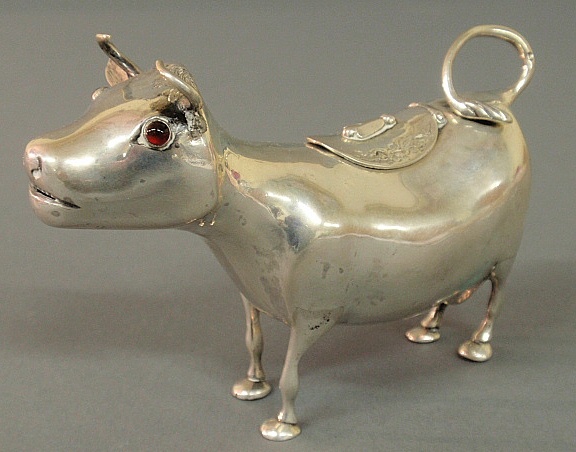 Appraisal: - Continental silver cow creamer late th c with red