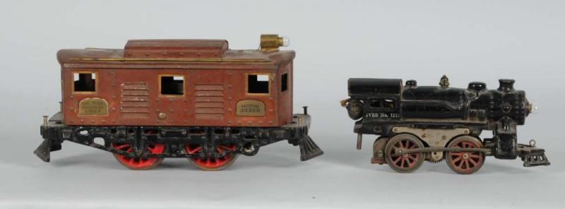 Appraisal: Pair of Ives Locomotives Description Includes O-gauge electric operated cast