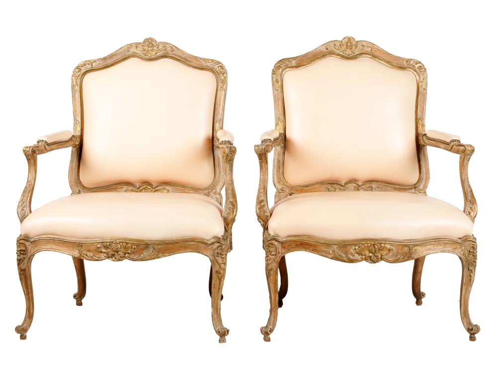 Appraisal: PAIR OF FRENCH PROVINCIAL-STYLE CARVED WOOD FAUTEUILS th century with