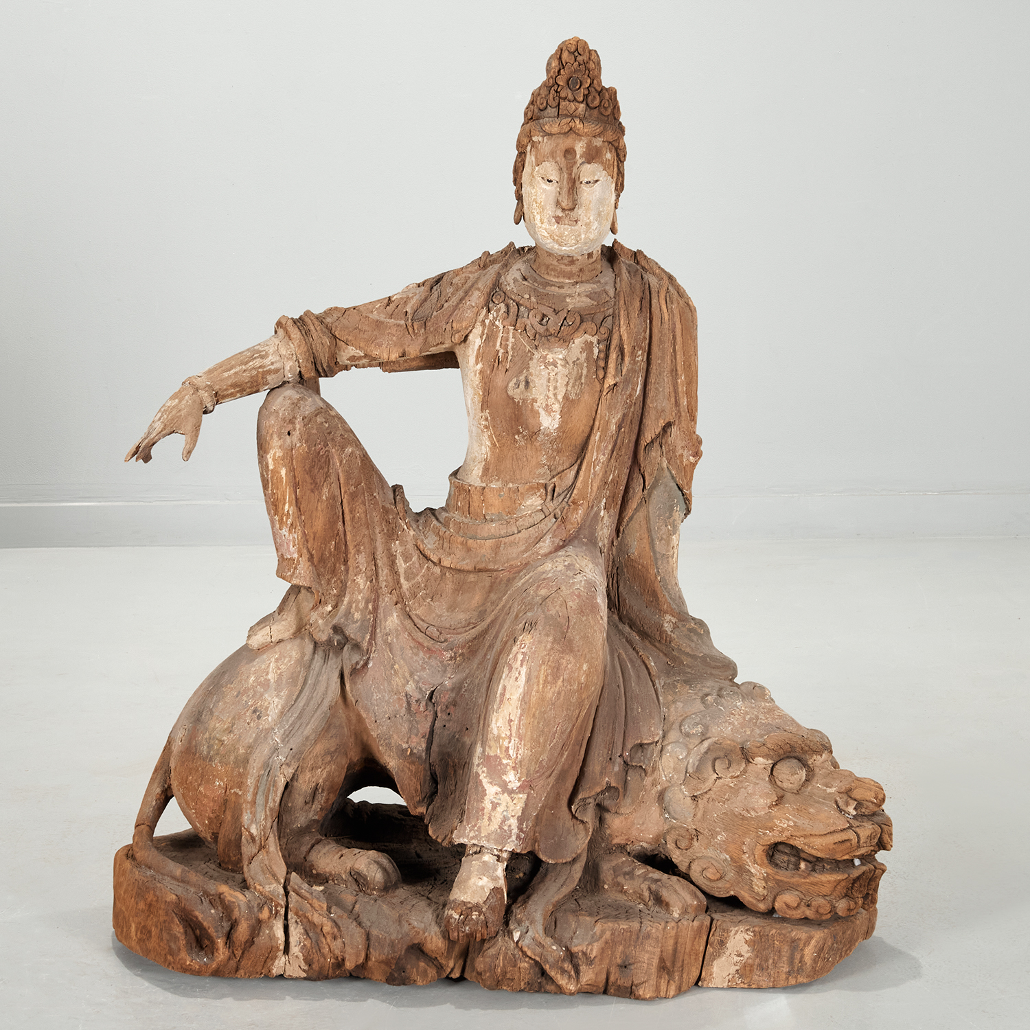 Appraisal: LARGE CHINESE CARVED WOOD GUANYIN ON LION Likely Ming Dynasty