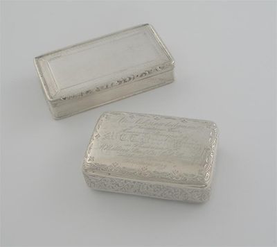 Appraisal: A Victorian engraved snuff box of rounded oblong form with