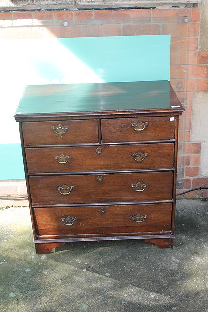 Appraisal: A TH CENTURY OAK STRAIGHT FRONT CHEST of two short