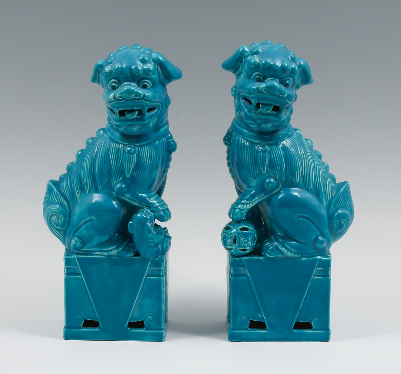 Appraisal: SET OF CHINESE MONOCHROME FOO DOGS Opposing blue glazed porcelain