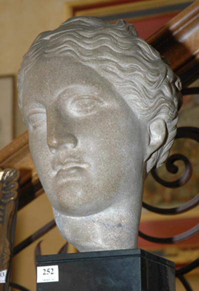 Appraisal: A CLASSICAL STYLE CERAMIC BUST OF A FEMALE Raised on