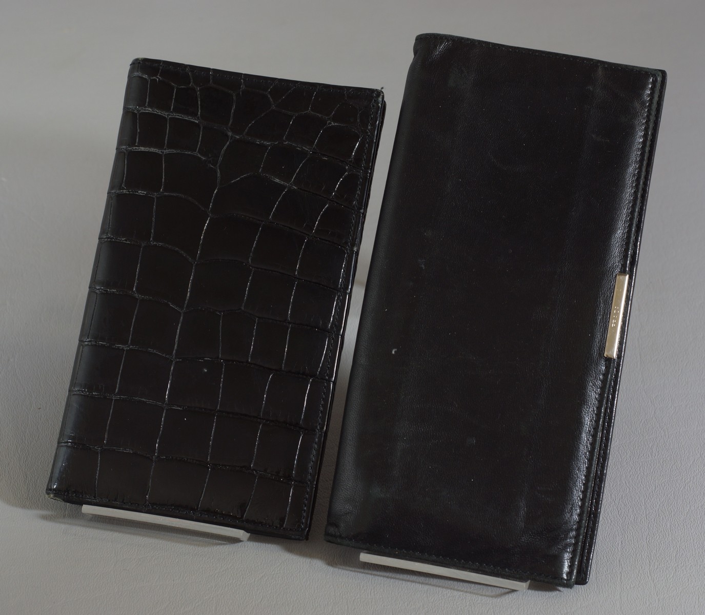 Appraisal: Men's Wallets including a Prada Black Leather Upright Wallet and