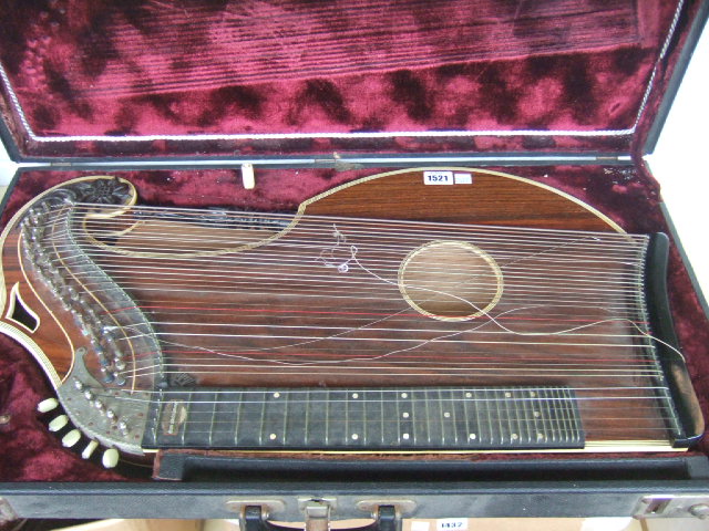 Appraisal: A rosewood and inlaid Zither by HUGO STELZHAMMER cased