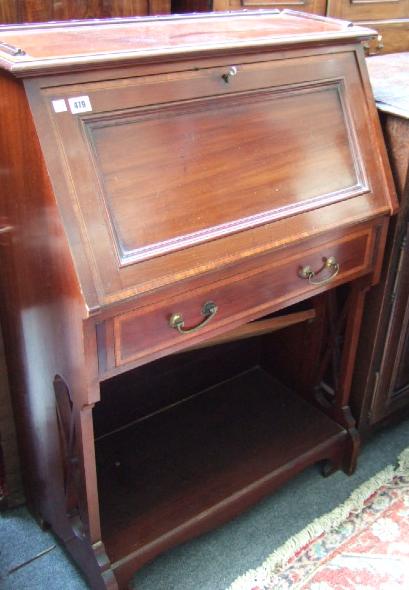 Appraisal: An Edwardian mahogany and inlaid student's bureau the fall opening