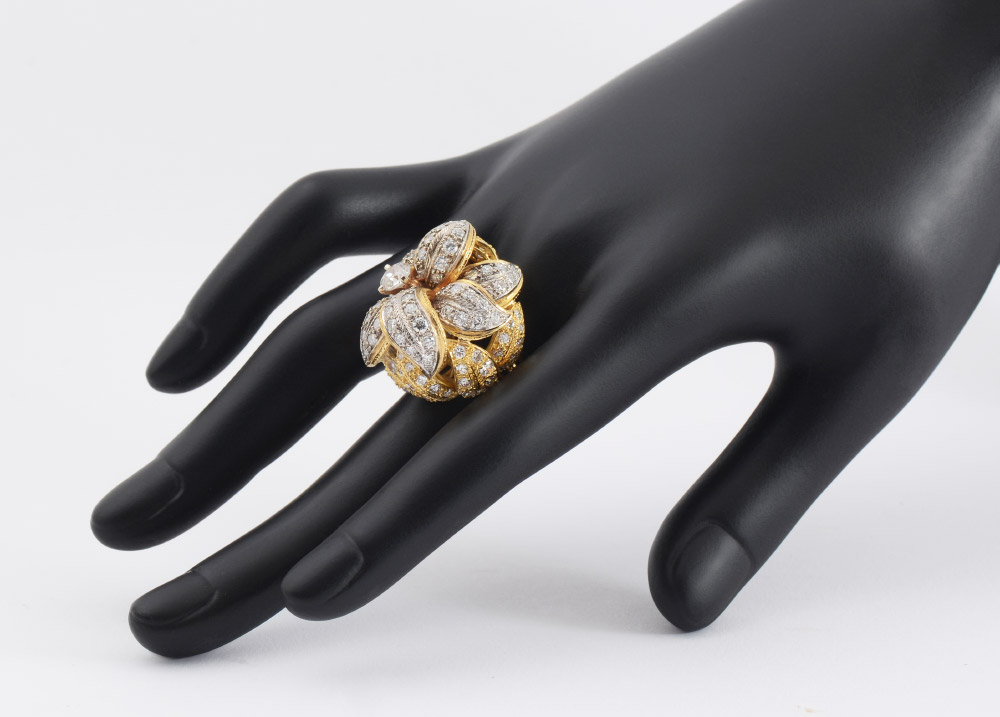 Appraisal: K DIAMOND FLOWER RING A high profile K yellow and