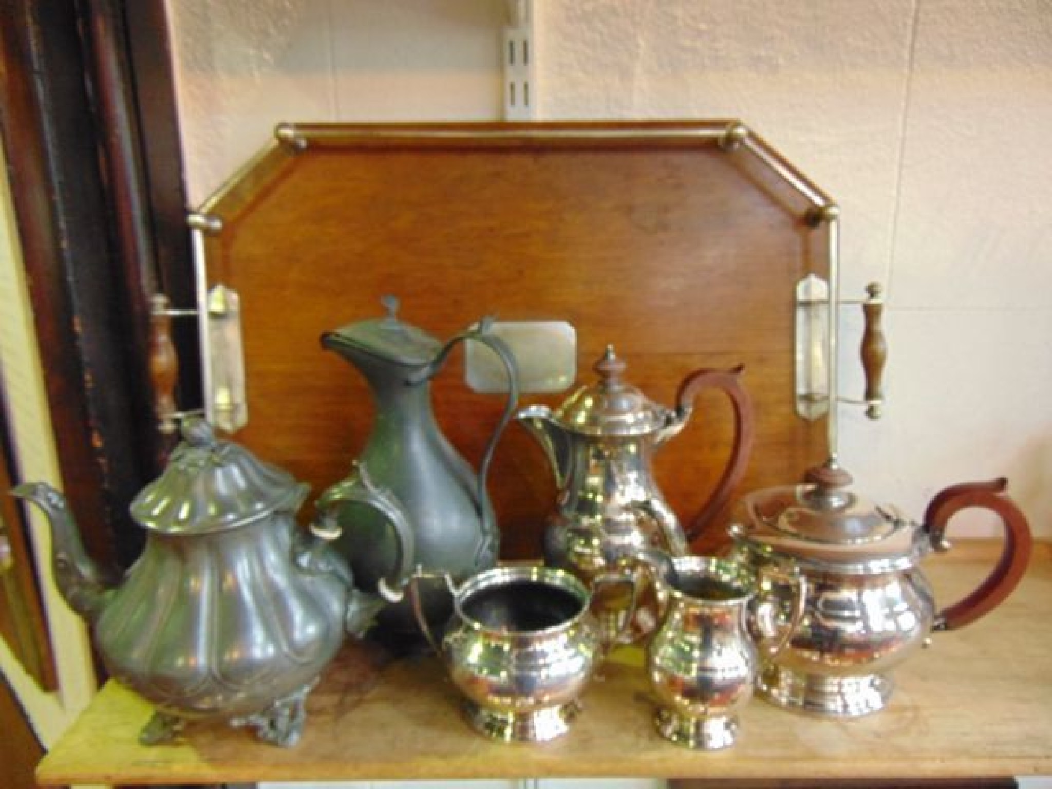 Appraisal: A three piece tea set comprising teapot hot water pot