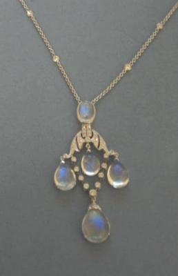 Appraisal: A MOONSTONE AND DIAMOND NECKLACE having four pear cabochon moonstones