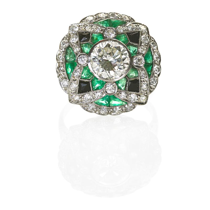 Appraisal: ART DECO DIAMOND EMERALD AND ONYX PLATINUM RING Round brilliant