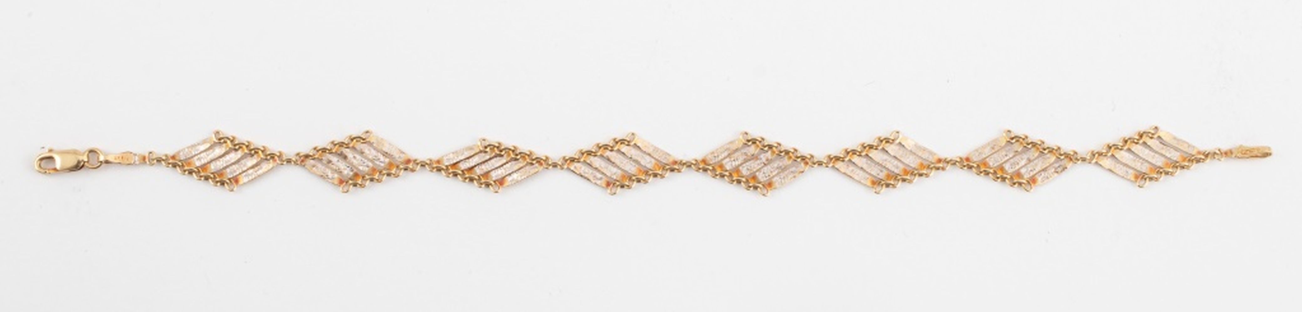 Appraisal: K YELLOW WHITE GOLD FLEXIBLE LINK BRACELET K Yellow and