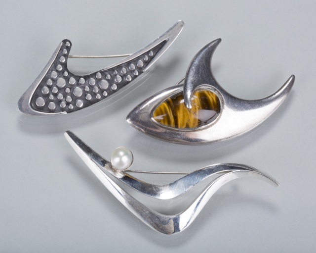 Appraisal: Sigi Pineda Modernist Brooches One boomerang design sterling brooch one