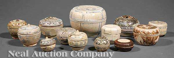 Appraisal: A Group of Thirteen Antique Chinese and Thai Sawankhalok Pottery