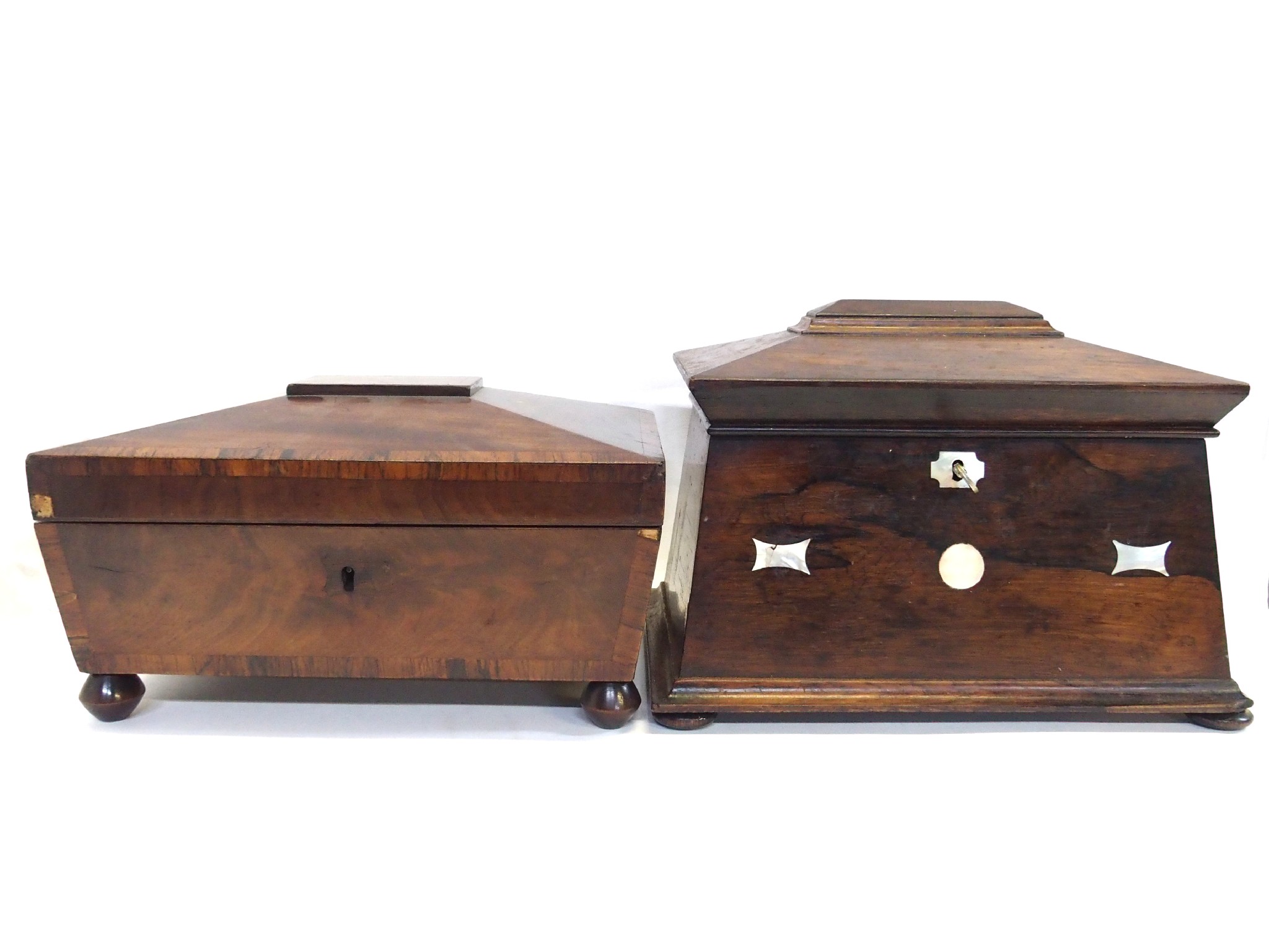 Appraisal: A mahogany sarcophagus two-sectioned tea caddy with mother of pearl