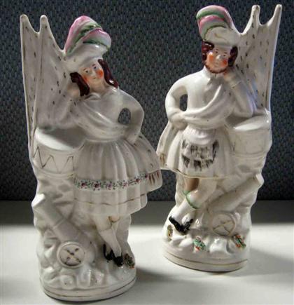 Appraisal: Pair of Staffordshire figures th century A lady and gentleman