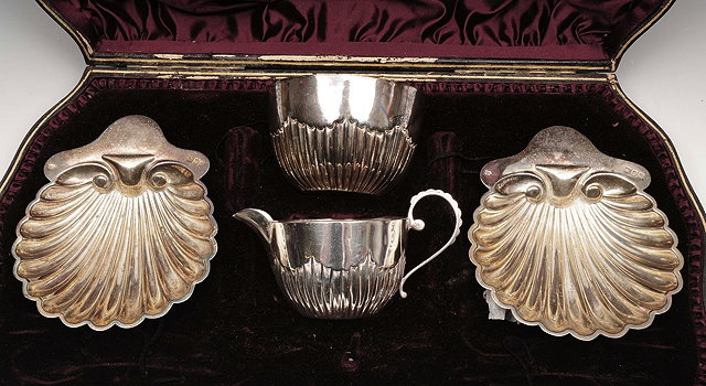 Appraisal: A PART VICTORIAN SILVER FOUR PIECE SET consisting of two