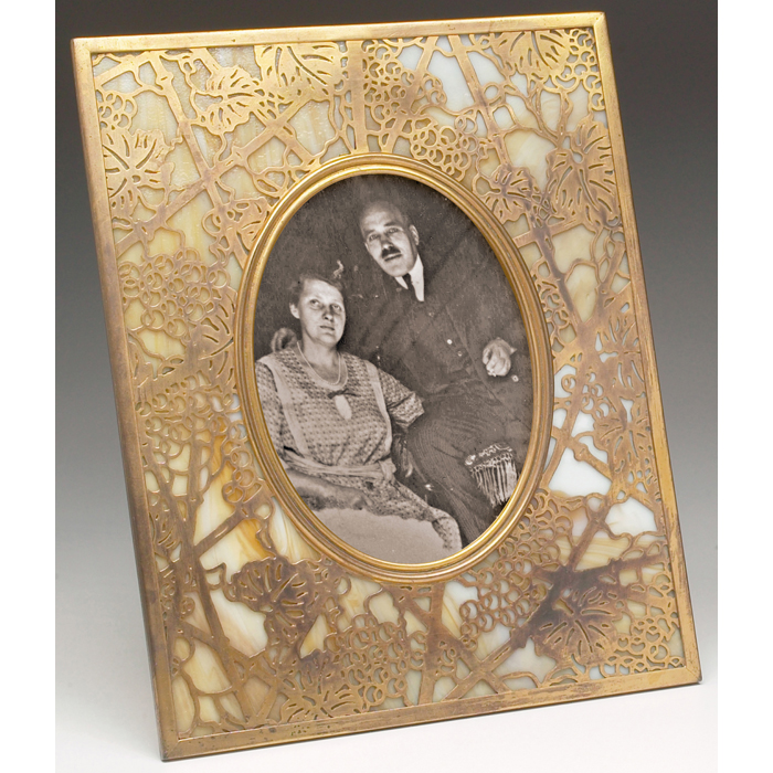 Appraisal: Tiffany Studios frame bronze in the grapevine pattern over caramel