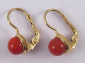 Appraisal: A pair of yellow metal tests carat gold coral earrings