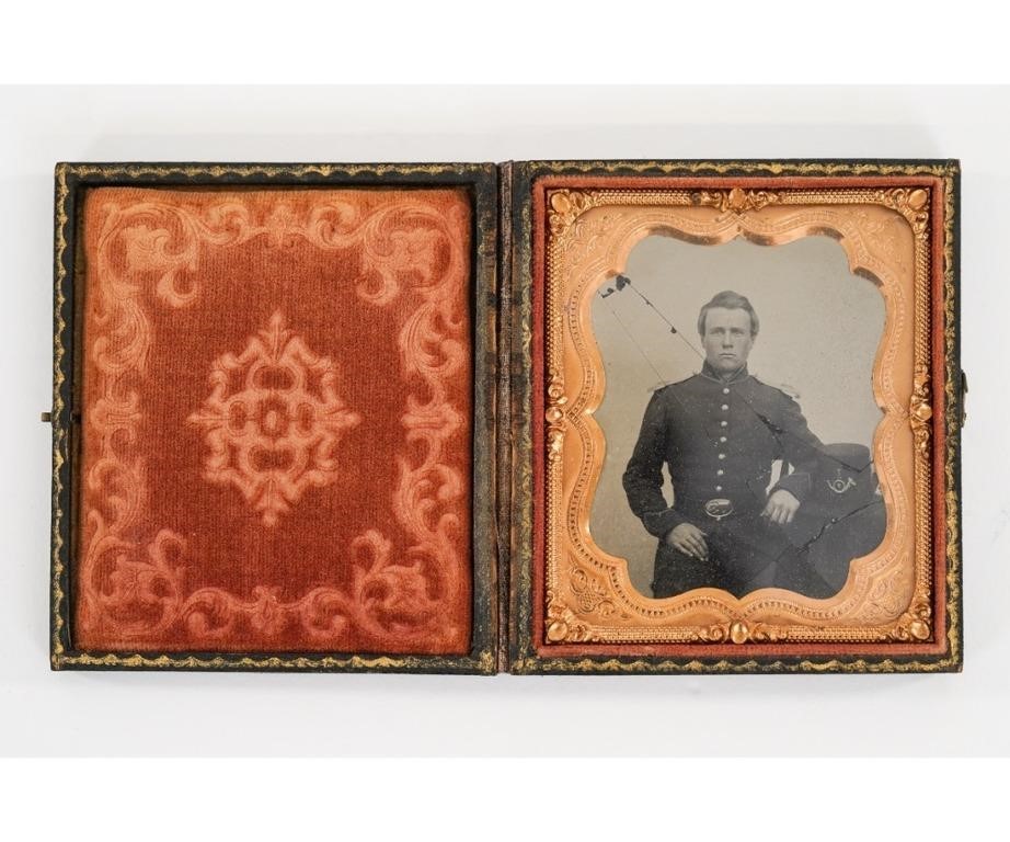 Appraisal: Civil War ambrotype of a Union officer standing cased in