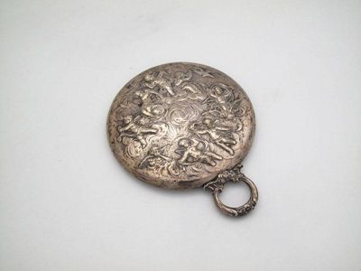 Appraisal: A German silver hand mirror circa circular form embossed cherub