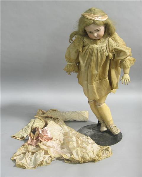 Appraisal: LARGE GERMAN BISQUE HEAD DOLL Early th century with bisque