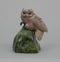 Appraisal: Carved Rhodinite Owl circa early th Century Carved pink Rhodinite