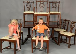 Appraisal: Mahogany dining table with three leaves and eight Chippendale style