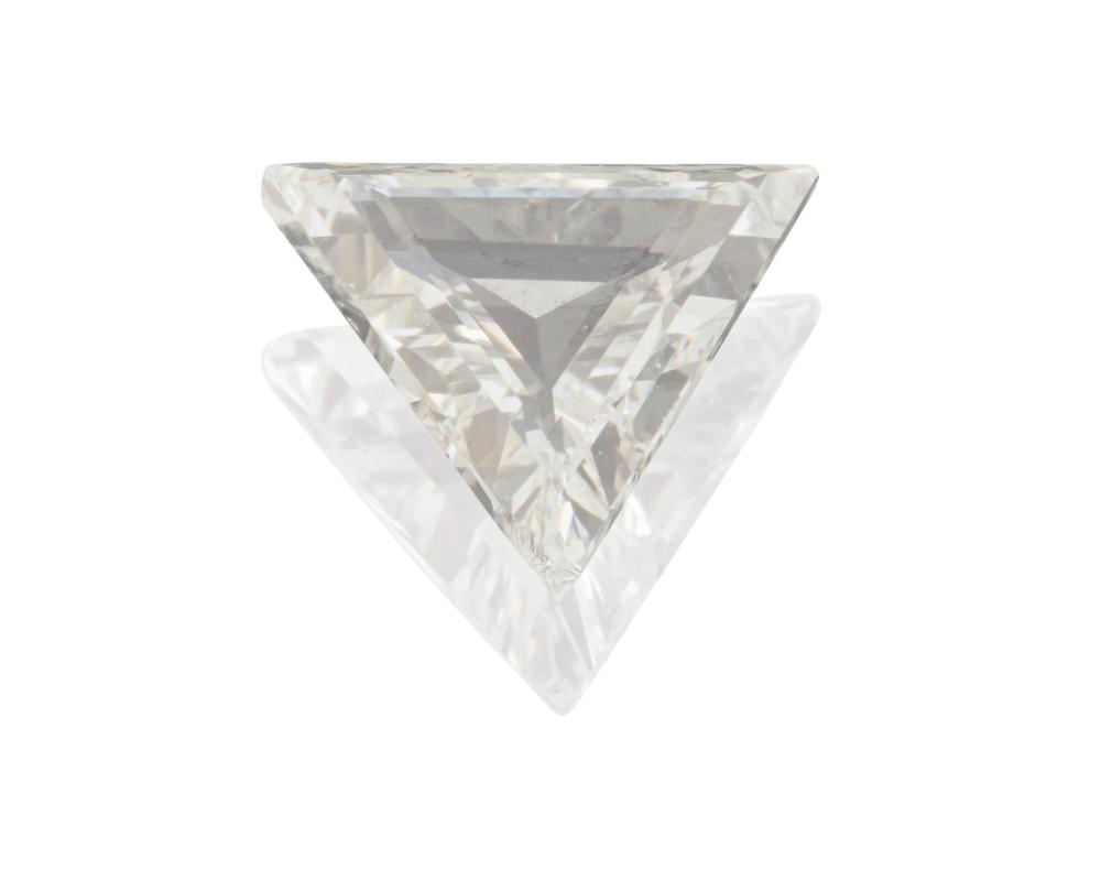 Appraisal: AN UNMOUNTED DIAMONDAn unmounted diamond A triangular step-cut diamond weighing