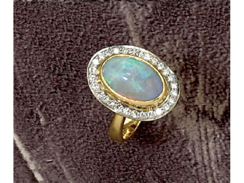 Appraisal: OPAL AND DIAMOND RING k yellow gold with bezel set