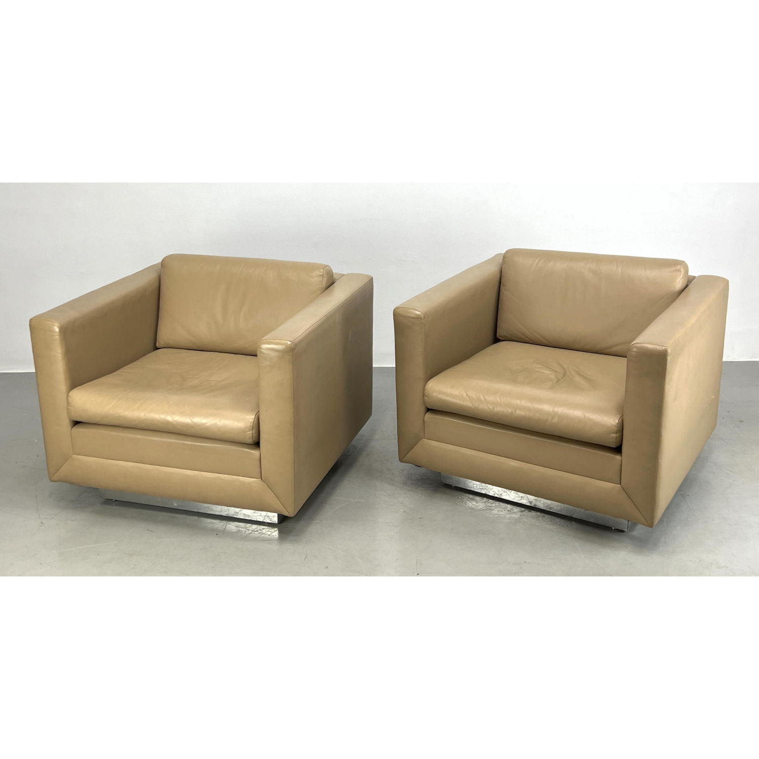 Appraisal: Pair GUNLOCKE Cube Lounge Chairs Chrome base trim Dimensions H