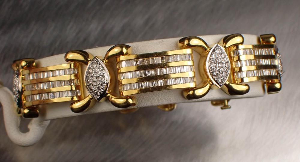 Appraisal: DIAMOND AND FOURTEEN KARAT TWO-TONE GOLD BRACELET The - heavy