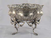 Appraisal: A German silver bowl on four lion's paw legs with