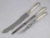 Appraisal: A matched silver handled carving set of knife fork and