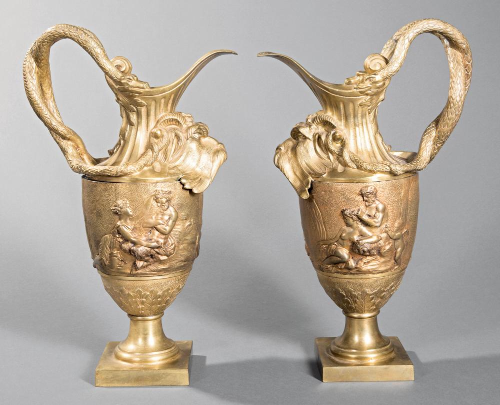 Appraisal: Pair of Neoclassical-Style Bronze Ewers c serpent handles grotesque mask