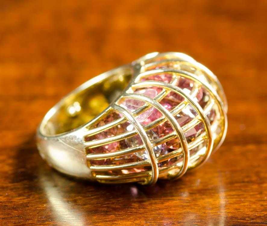 Appraisal: EIGHTEEN KARAT YELLOW GOLD CAGE RING featuring a yellow gold