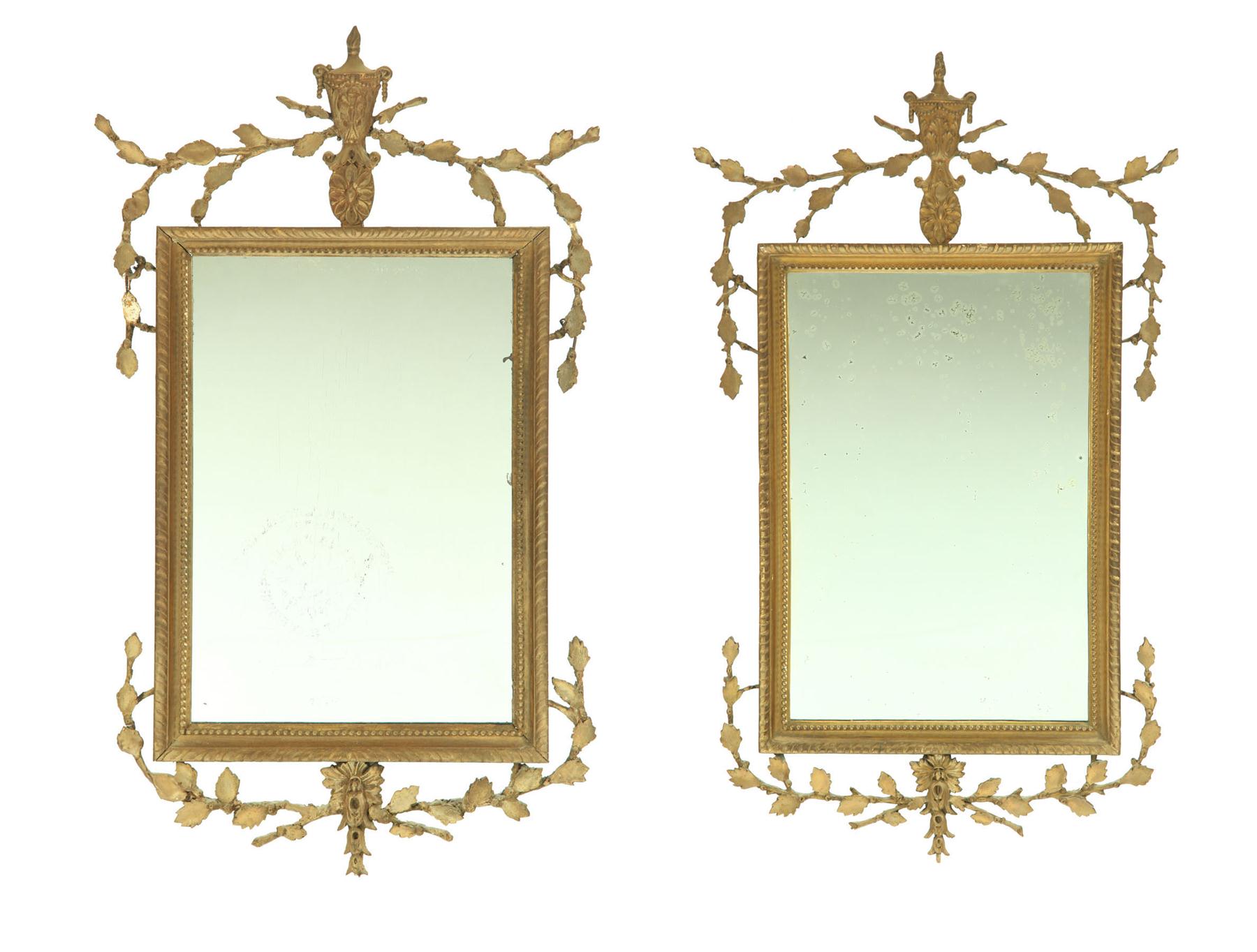 Appraisal: PAIR OF MIRRORS Continental th century pine Applied urn crests