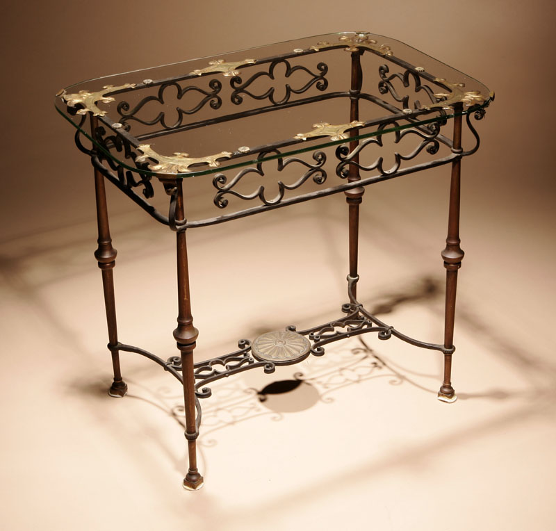 Appraisal: A Trinkkeller parcel-gilt wrought iron and glass occasional table A